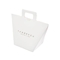 Biểu trưng tùy chỉnh Túi giấy Kraft trắng hiện tại 9,5 * 9 * 12cm Túi quà tặng Pháp có ruy băng